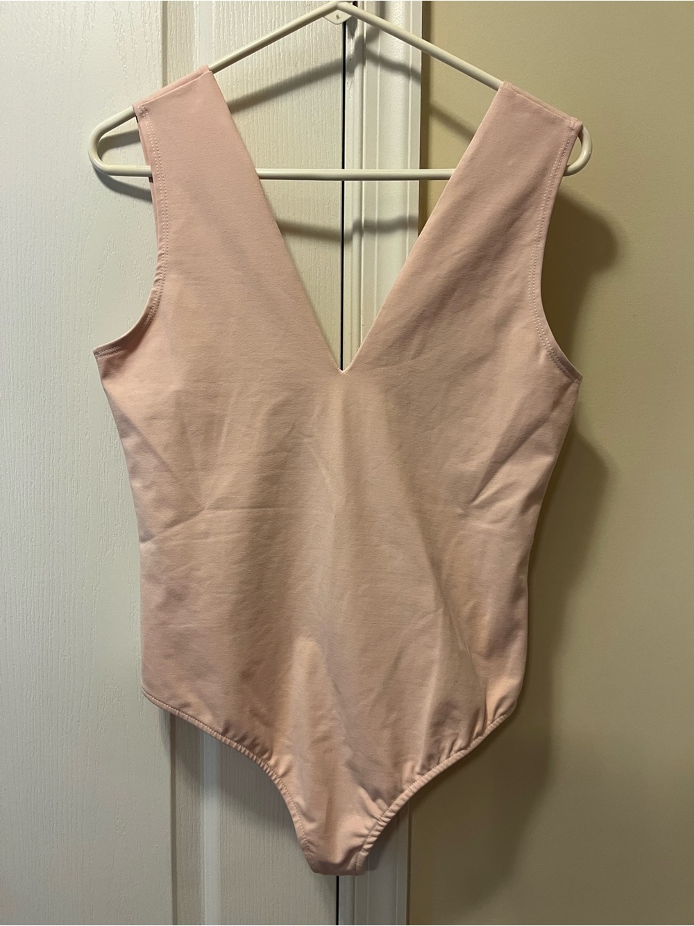 Free People Pale Pink V-Neck One-Piece Bodysuit